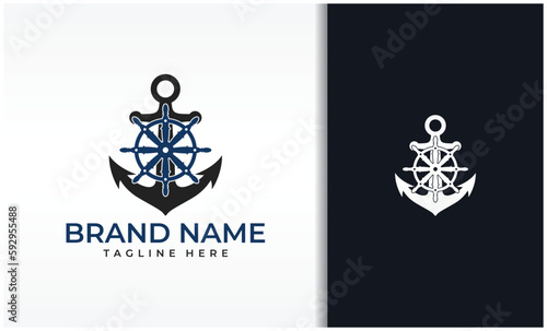 Ship's Anchor And Steering Wheel Logo