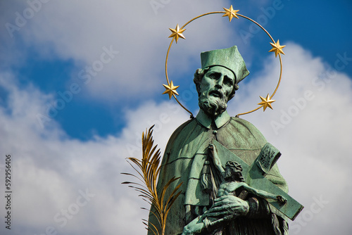 Detail view of statue St. John of Nepomuk on Charles bridge, Prague. Czech Republic.
