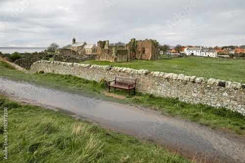 Priory on coastal hillside at Holy Island