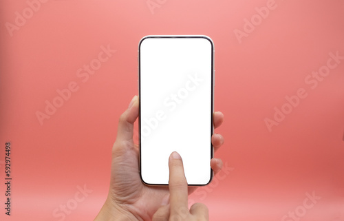 woman holding blank screen mobile on pink background. PNG