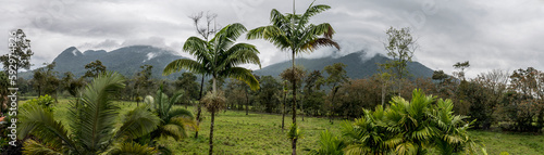 A panorama view of the cloud covered Arenal volcano on the outskirts of La Fortuna, Costa Rica in the dry season