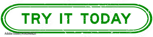 Grunge green try it today word rubber seal stamp on white background