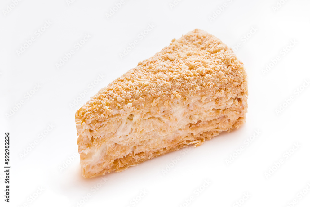 a Triangle piece of honey cake on a white background a Triangle piece of honey cake on a white background