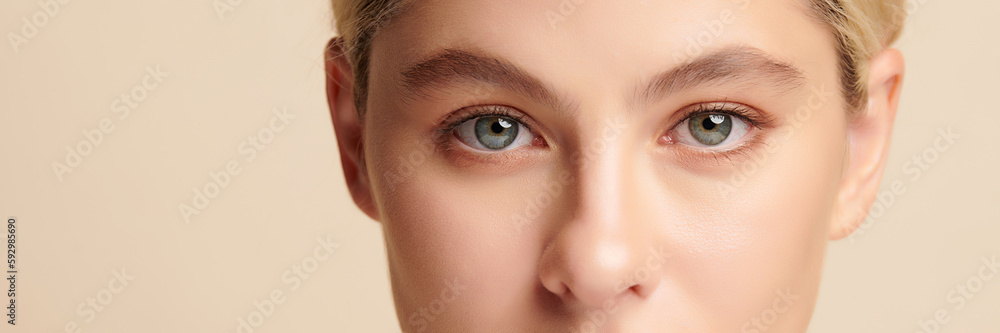 close up of beauty woman eye on beige background, Makeup, Cosmetics, Beauty,