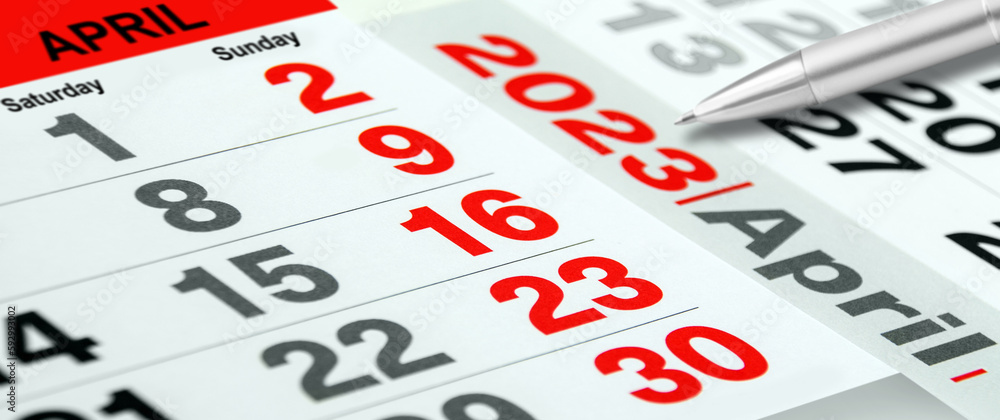 Calendar April 2023 Saturday Sunday with pencil close up Calendar April 2023 Saturday Sunday with pencil close up