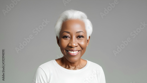 Portrait of mature beautiful woman with grey hairstyle and white top. Model studio shot. Copy space. Generative AI