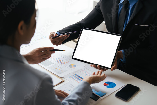 Close up view of business people working with new project, presentating and analyzing the marketing and investment plan. photo