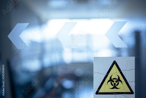 Biochemistry lab with biohazard sign on the door