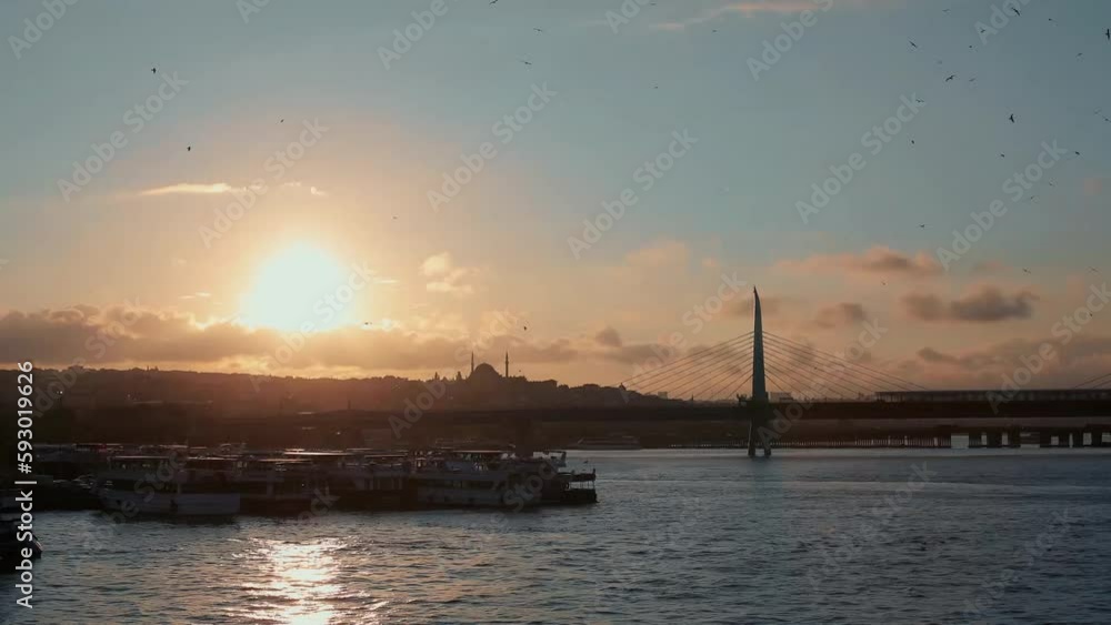 Sun is setting down 4K time lapse panorama clip with Halic metro bridge. Taken from Galata Tower, Istanbul, Turkey Sun is setting down 4K time lapse panorama clip with Halic metro bridge. Taken from Galata Tower, Istanbul, Turkey