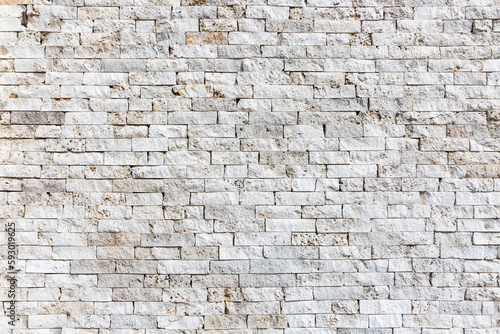 stone wall background made of white bricks