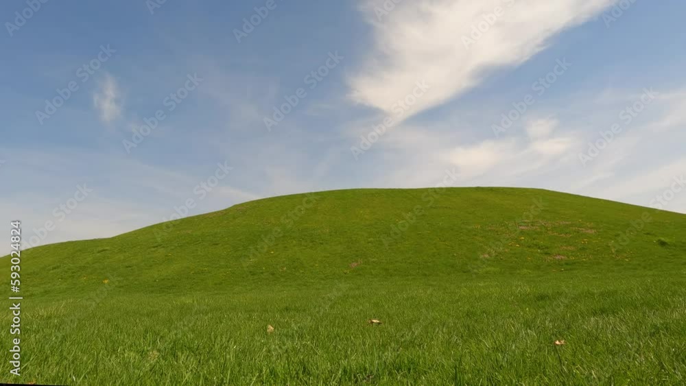 Idyllic Green Hill and Meadow Outdoor Springtime Scene Idyllic Green Hill and Meadow Outdoor Springtime Scene