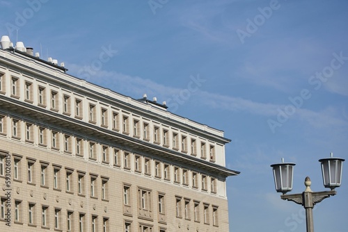 Closeup shot of modern unique buildings in Berlin, Germany with blue sky in the background