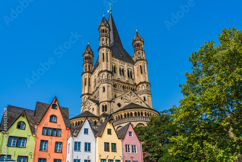 Cologne, North Rhine Westphalia, Germany: Great St. Martin church and colorful houses in the old town of Cologne