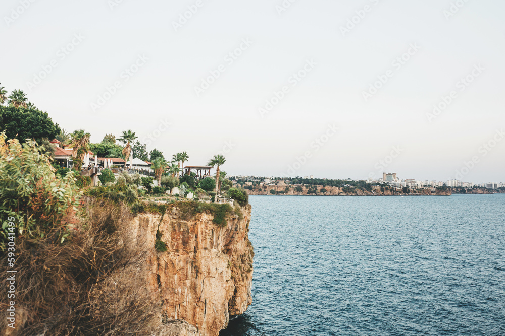 Beautiful restaurant on the edge of the rocky seashore in Antalya, Turkey Beautiful restaurant on the edge of the rocky seashore in Antalya, Turkey