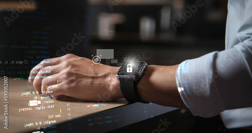 Cyber security on a smart watch, man hand wearing a smart watch with security alerts , secure home alarm