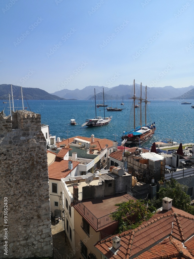 Fototapeta premium view of the old city of Marmaris. bay of the city of Marmaris Trkiye. City by the sea. Pier on the background of mountains and the sea