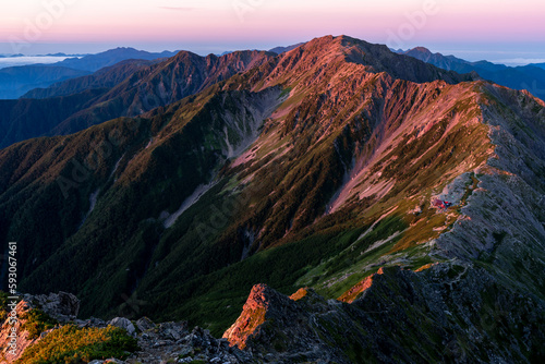 朝陽に照らされた間ノ岳 Mt.Ainodake illuminated by the morning sun photo