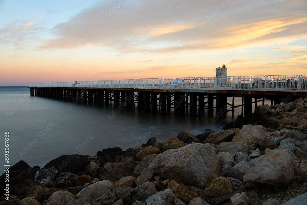 sunset over the pier sunset over the pier