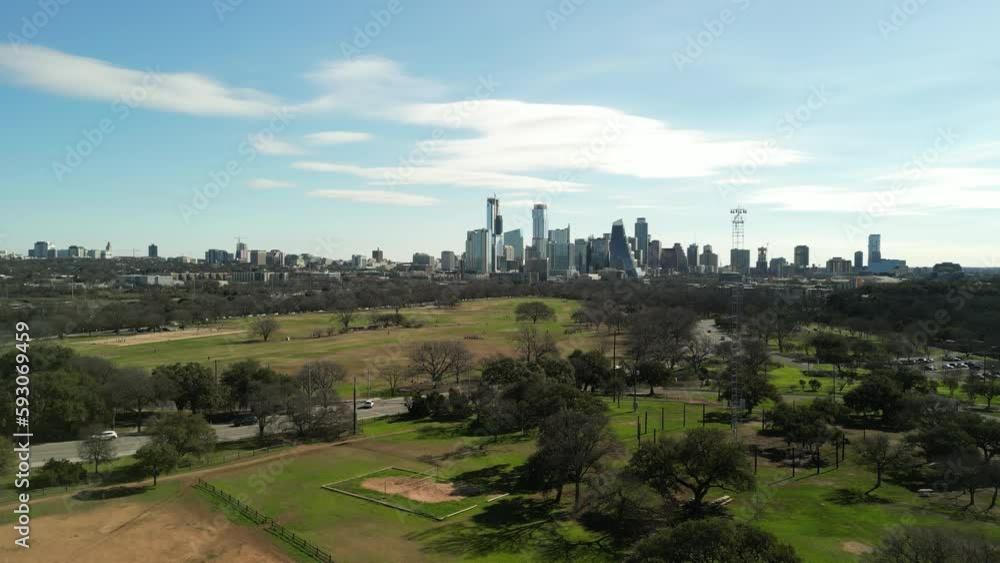 Aerial establishing shot of Downtown Austin Texas Skyline from zilker park Aerial establishing shot of Downtown Austin Texas Skyline from zilker park