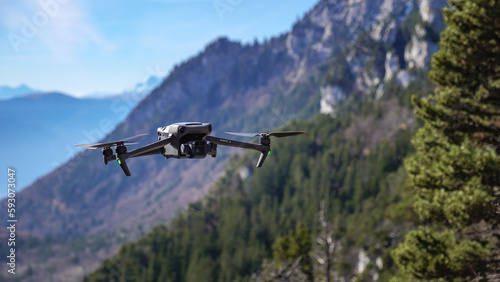 Flying drone in french alps.