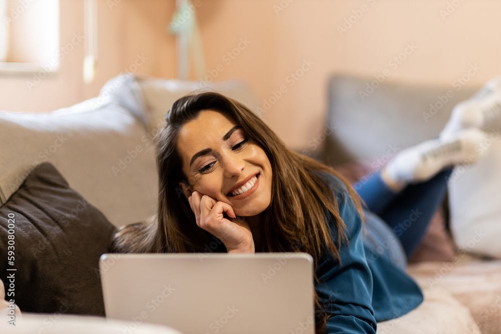 Young woman having a video call with her partner. Young woman having a video call with her partner.