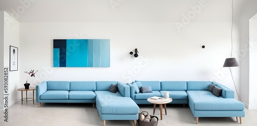 Photo of a modern living room with a comfortable blue sectional couch as the centerpiece