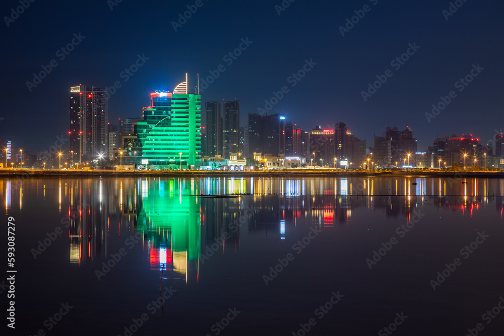 Manama illuminated downtown on the shore of Persian gulf, Manama, Bahrain