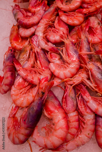 Background of fresh cooked prawns for sale at a market