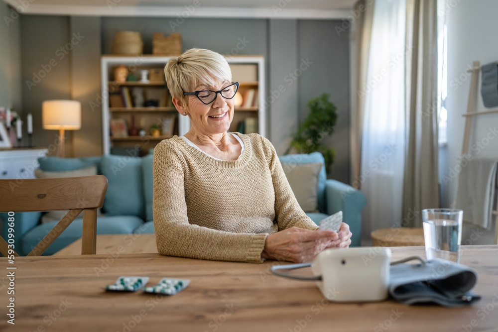 One senior caucasian woman take medicine drugs or supplement vitamin One senior caucasian woman take medicine drugs or supplement vitamin