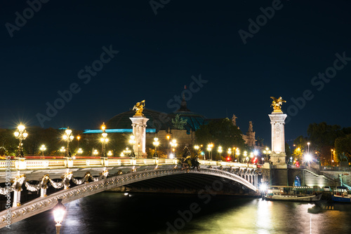 Pont Alexandre III at night in Paris, France