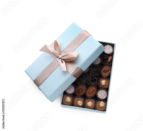 Box of delicious chocolate candies isolated on white, top view