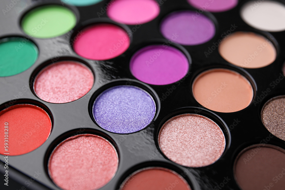 Beautiful eyeshadow palette as background, closeup. Professional cosmetic product Beautiful eyeshadow palette as background, closeup. Professional cosmetic product