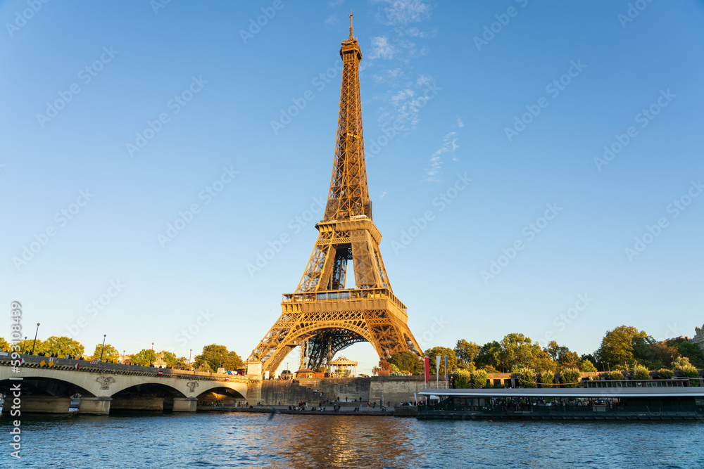 Fototapeta premium Eiffel Tower by Seine river in Paris