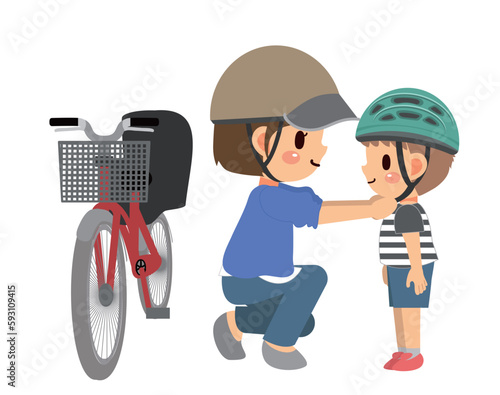 自転車用のヘルメットを子供にかぶらせているお母さん