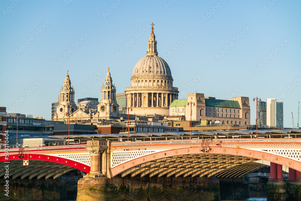 Dome of Saint Paul cathedral behind Blackfriars bridge in London