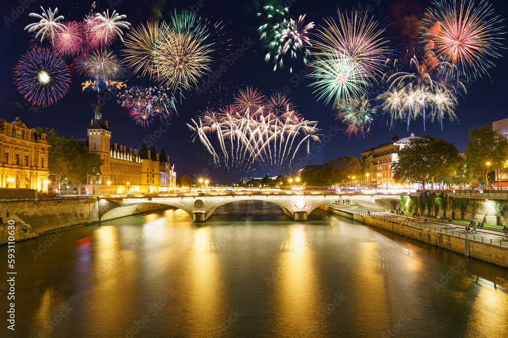 Fototapeta premium Fireworks show near Pont Change bridge and Conciergerie in Paris. France