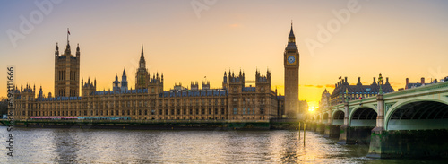 Big Ben and Westminster panorama at sunset in London. England