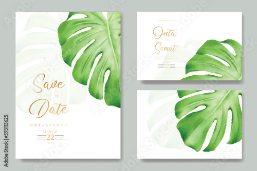 Wedding invitation card save the date design with green tropical monstera palm leaves 