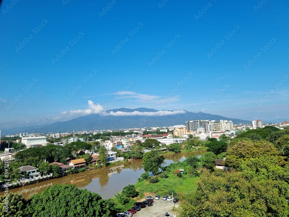 view of the cityView of the city of Chiang Mai in Thailand overlooking the top of Doi Suthep.  Bright sky, view from the ward at Rajavej Hospital