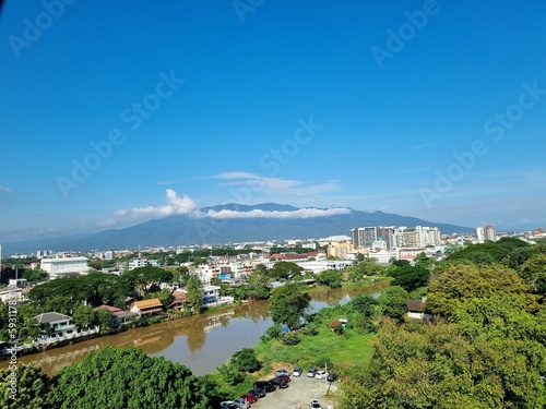 view of the cityView of the city of Chiang Mai in Thailand overlooking the top of Doi Suthep.  Bright sky, view from the ward at Rajavej Hospital