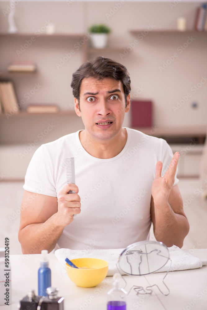 Young man shaving face at home Young man shaving face at home