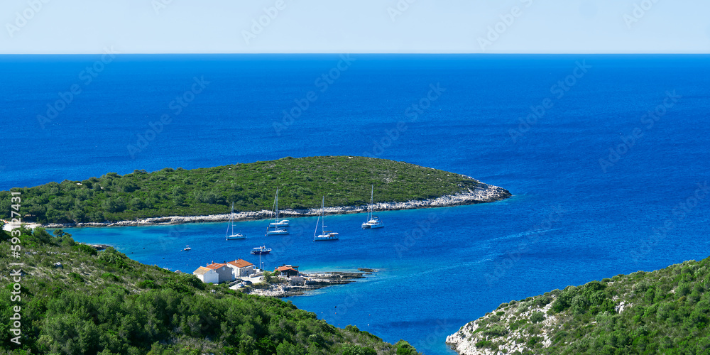 An island in the adriatic sea. Green island in blue adriatic sea , Dalmatia, Croatia. Travel destination, paradise, Travel concept