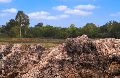 Mounds of earth and stones isolated on white background, clipping path