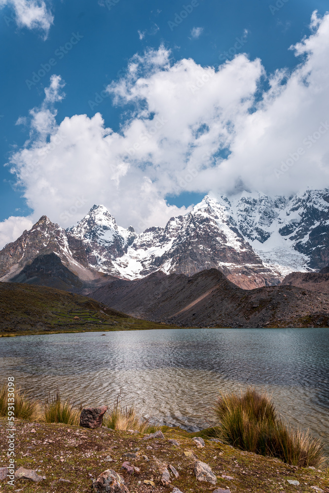 reflection of the snow-capped mountains in the lagoons of Ausangate, Cusco-Peru, South America, Andes