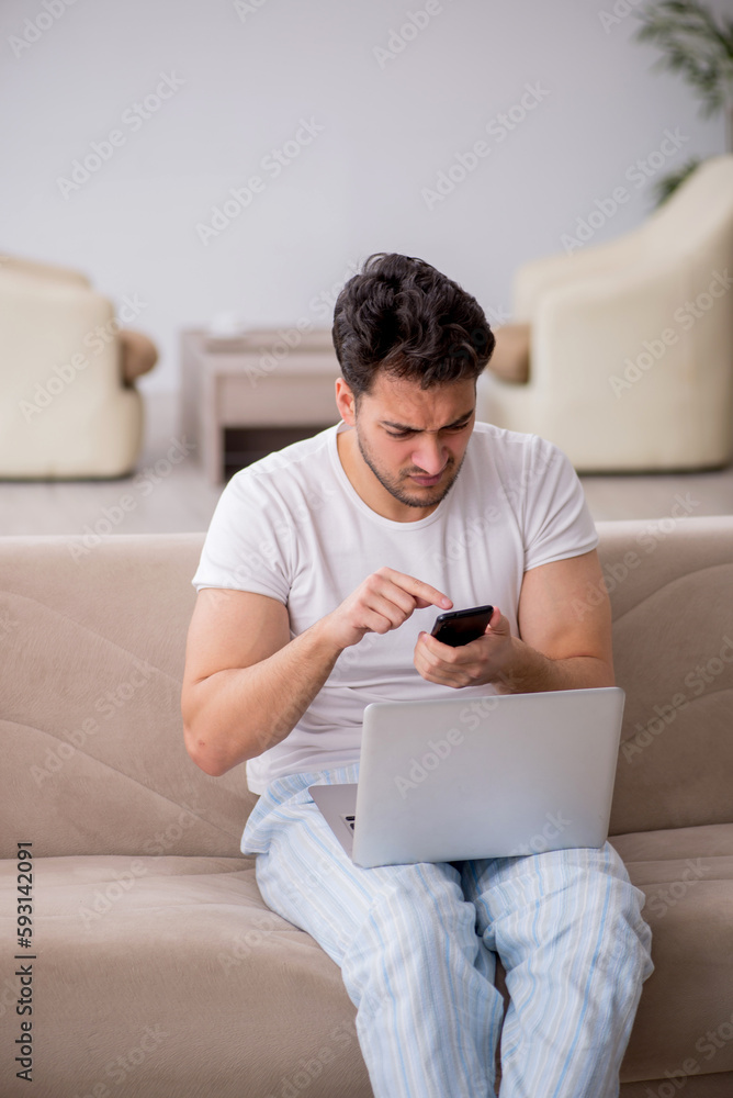 Young man starting day at home Young man starting day at home