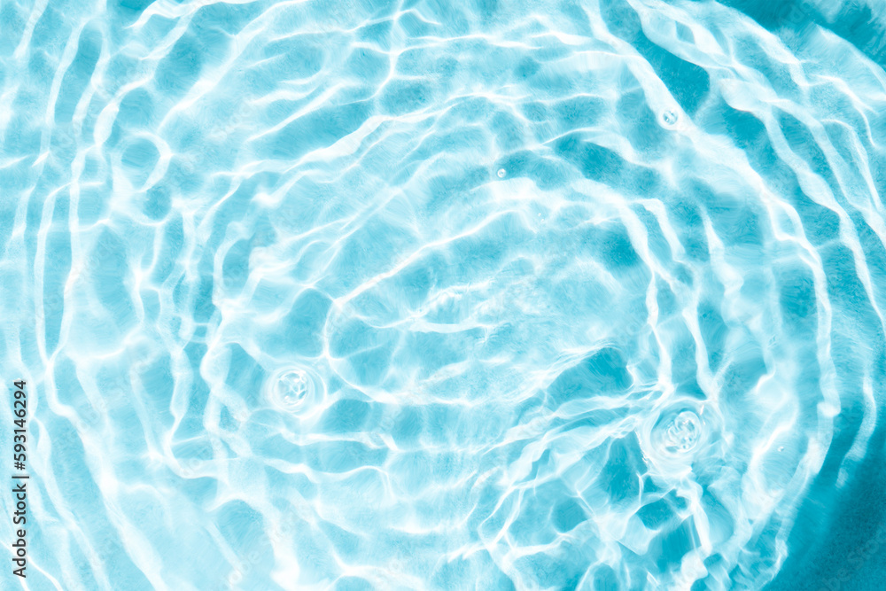 Crystal clear water ripples, abstract background.