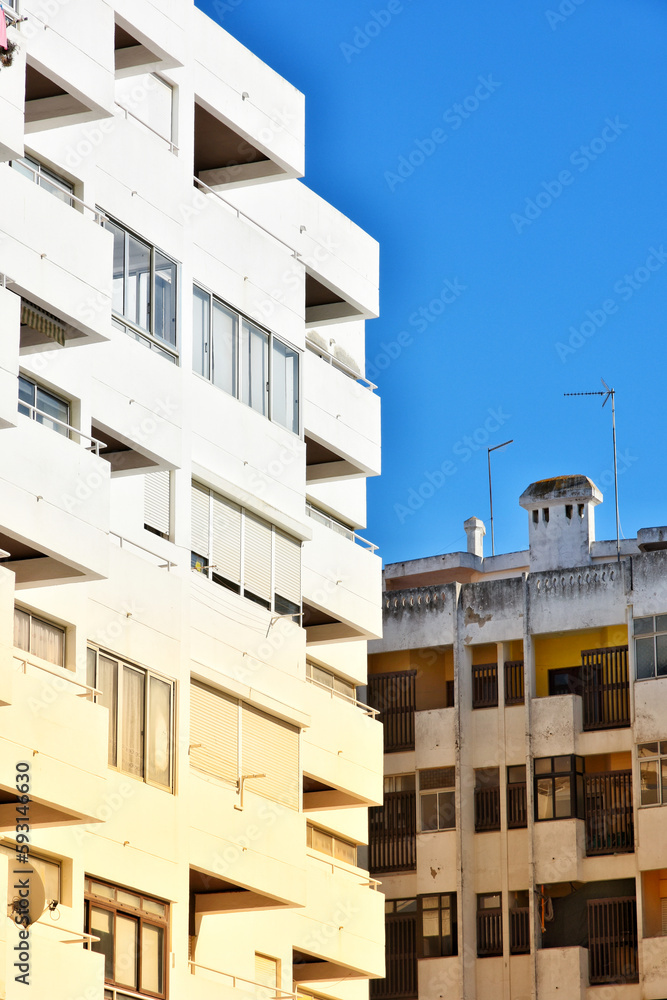 Low angle view of modern condo building in Armacao de Pera