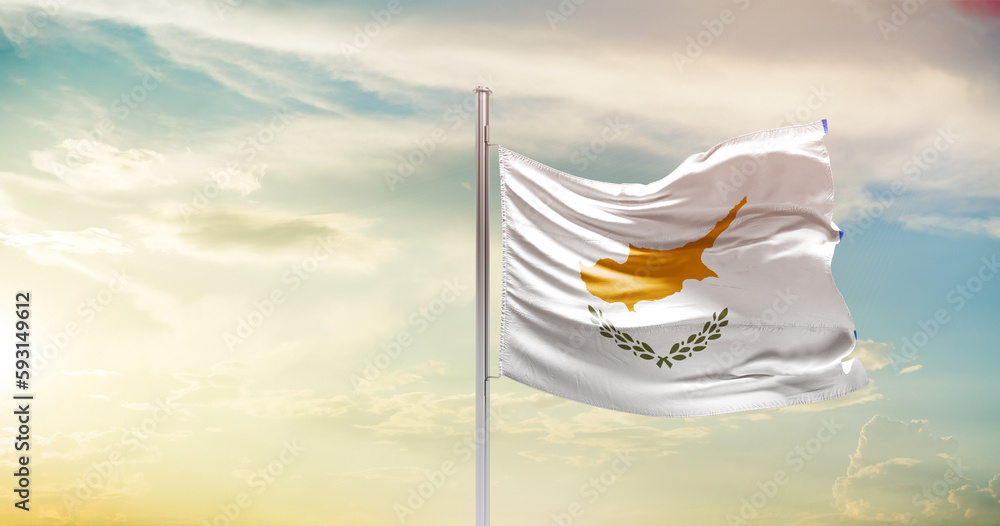 Cyprus national flag waving in beautiful sky. The symbol of the state on wavy silk fabric.