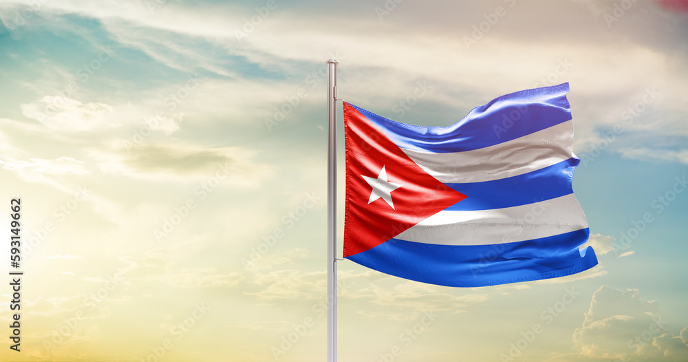 Cuba national flag waving in beautiful sky. The symbol of the state on wavy silk fabric.