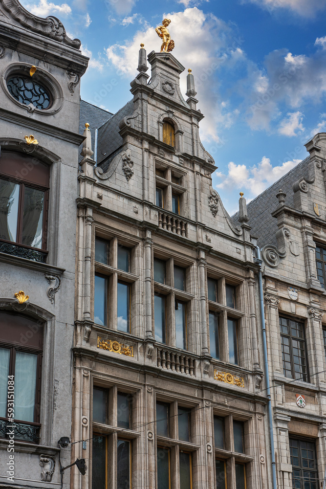 Facades of medieval houses with tiled roofs in the center of Antwerp, Belgium